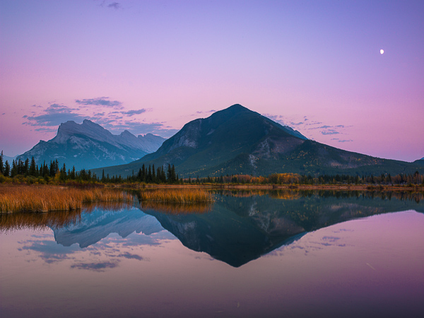 Mountain reflections within one of the Vermillion Lakes of Banf.   Mount Rundle in the distance shows its jagged edges.