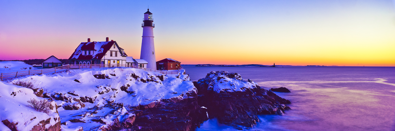 Day begins to break but offers no warmth to this frozen winter day on the Maine coast. Portland Head Light greats the sun with...