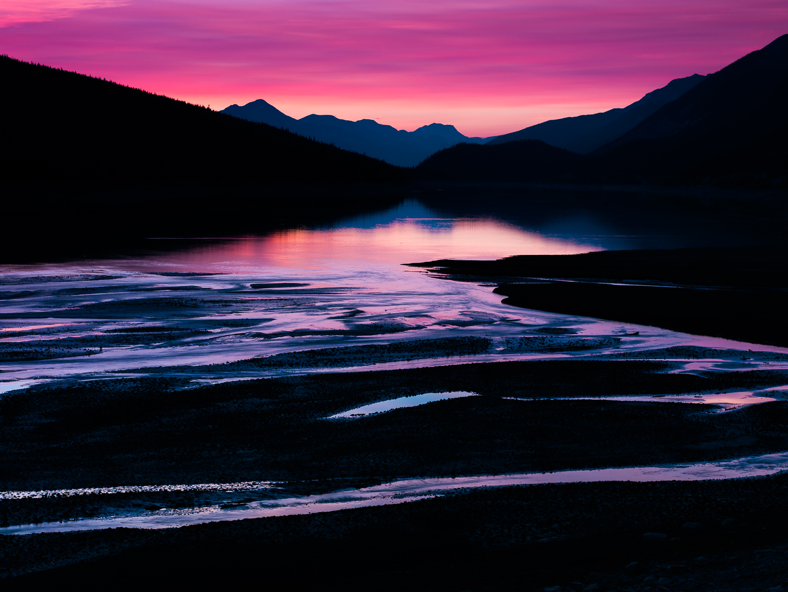 Medicine Lake at sunset offers patterns of light bouncing off the waters from the filling streams.