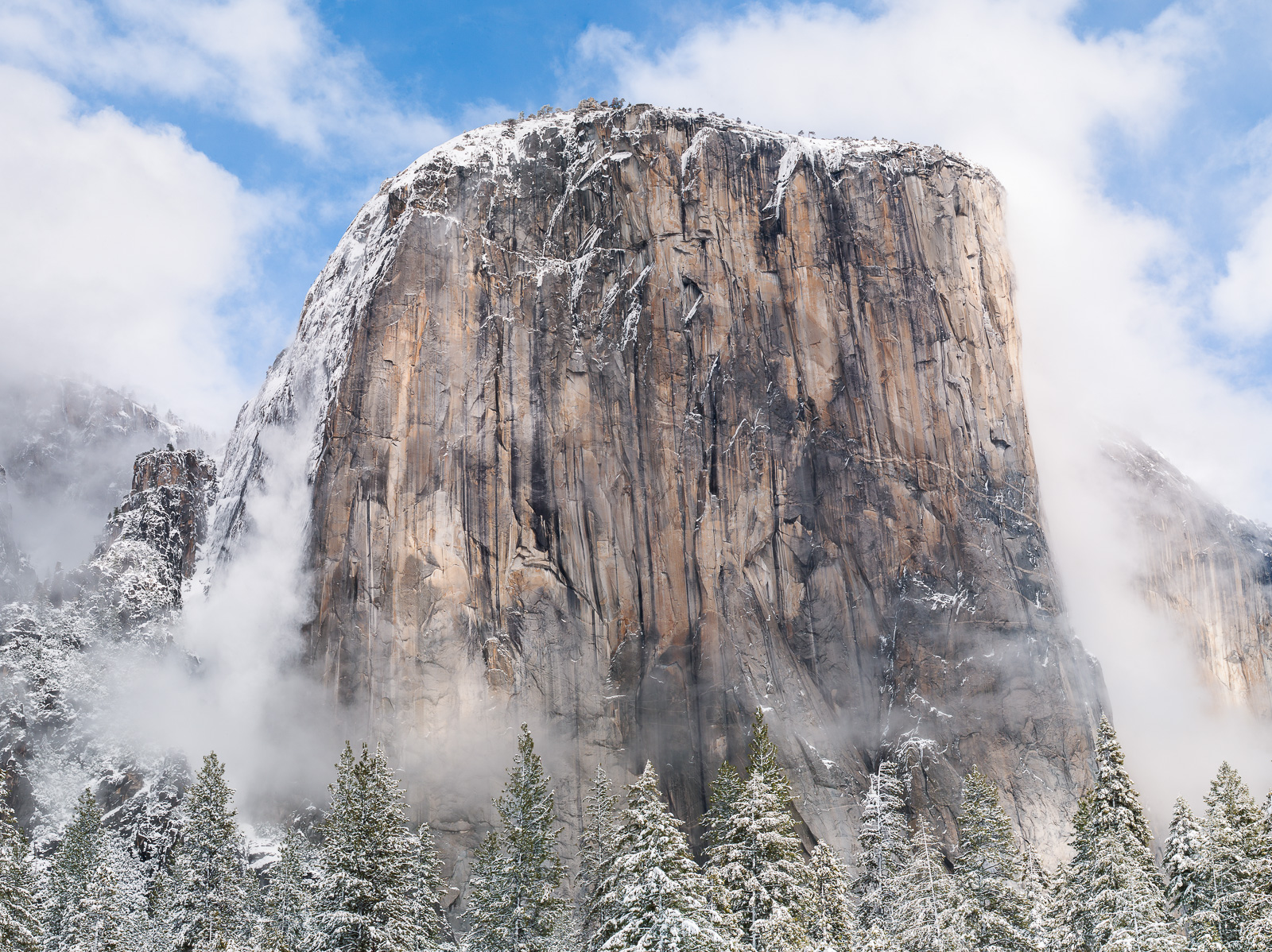 El Capitan sheds snow from last nights storm.   What a grand sight indeed!