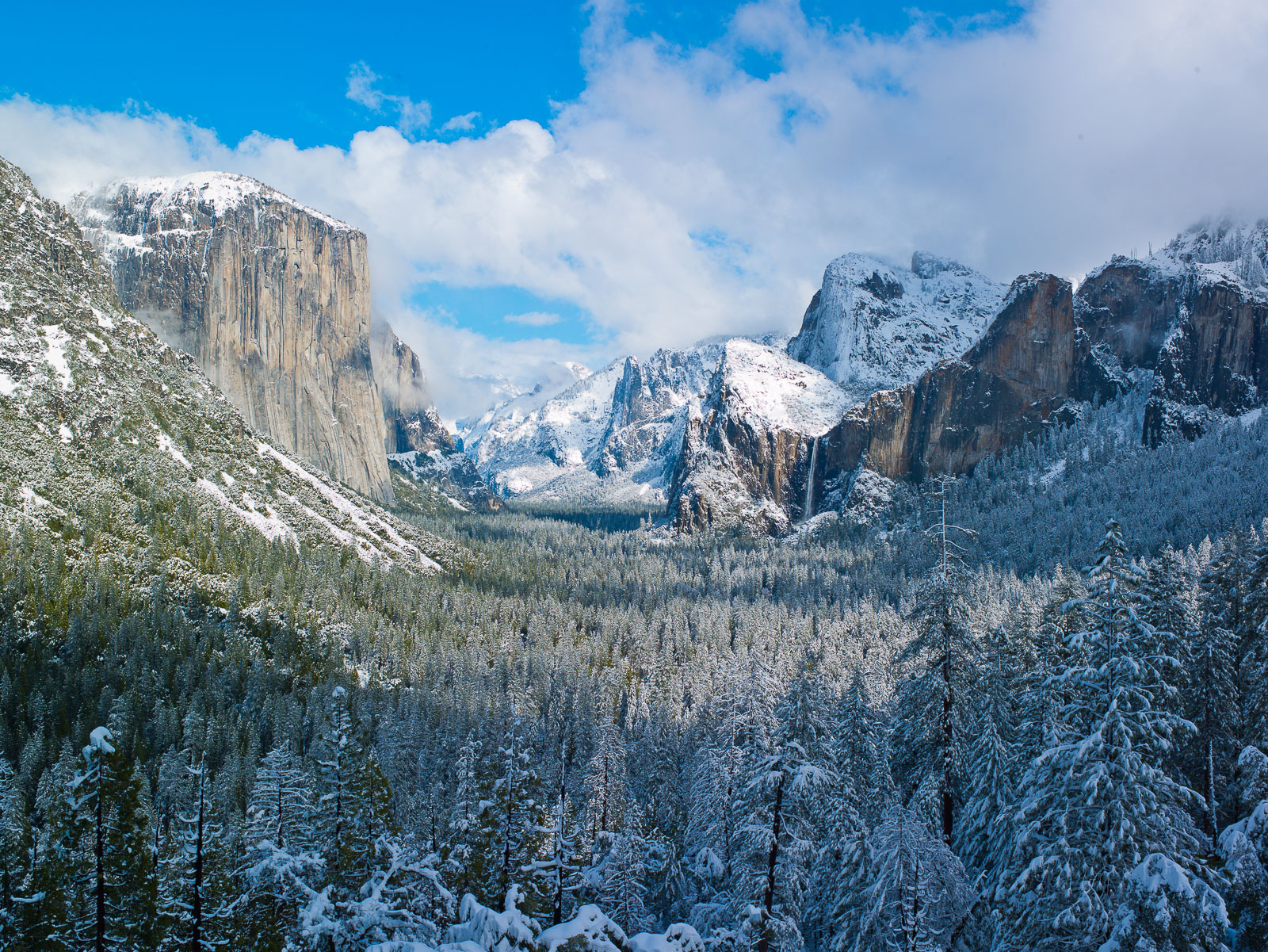 A snow laden Yosemite awakens to a new winter paradise.