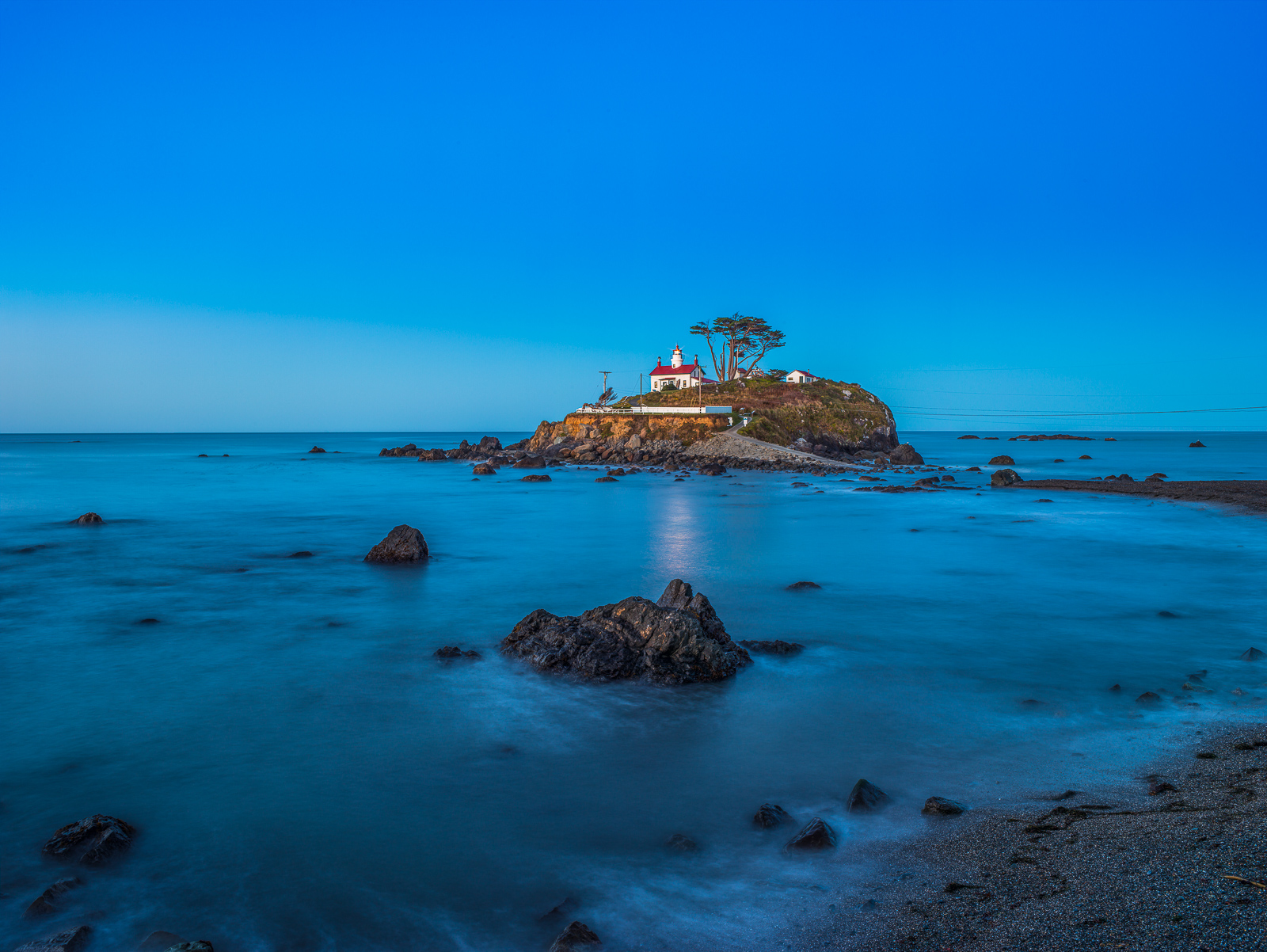 A beacon to the redwood forest Battery Point Lighthouse stands guard.