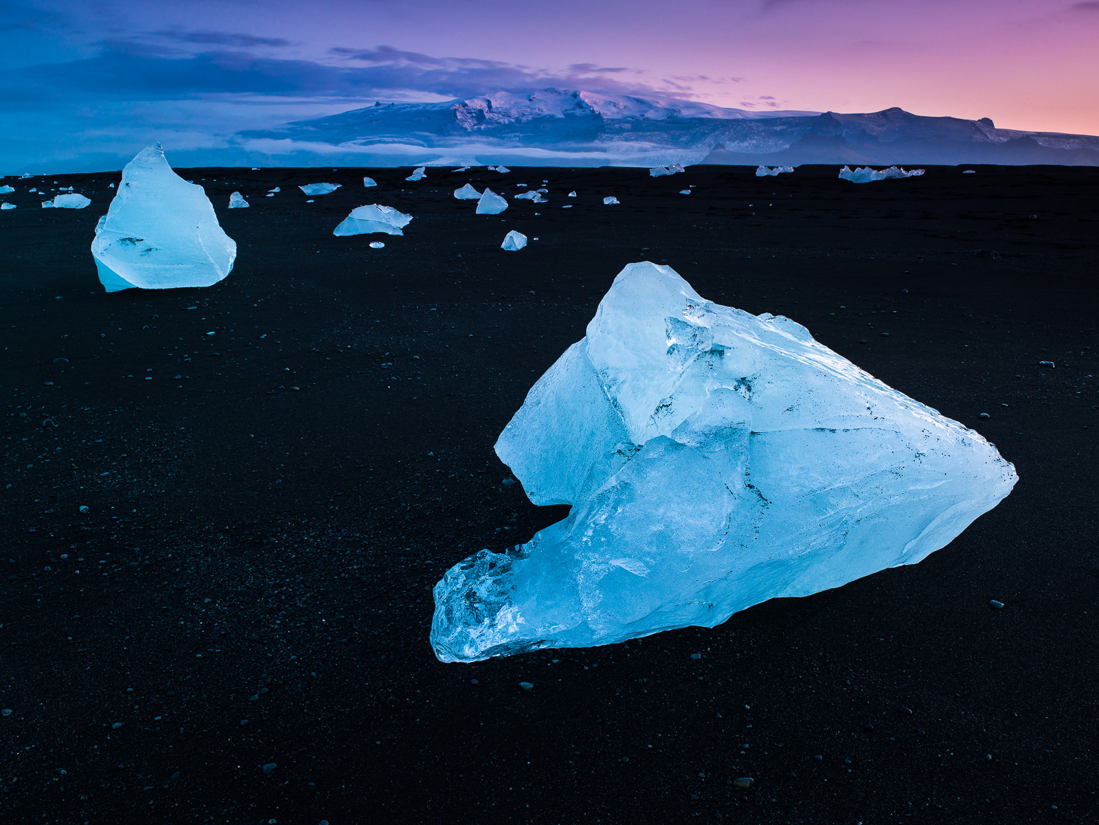 Midnight light in Iceland is a dreamy thing indeed.   Huge ice chucks wash ashore from nearby glaciers.