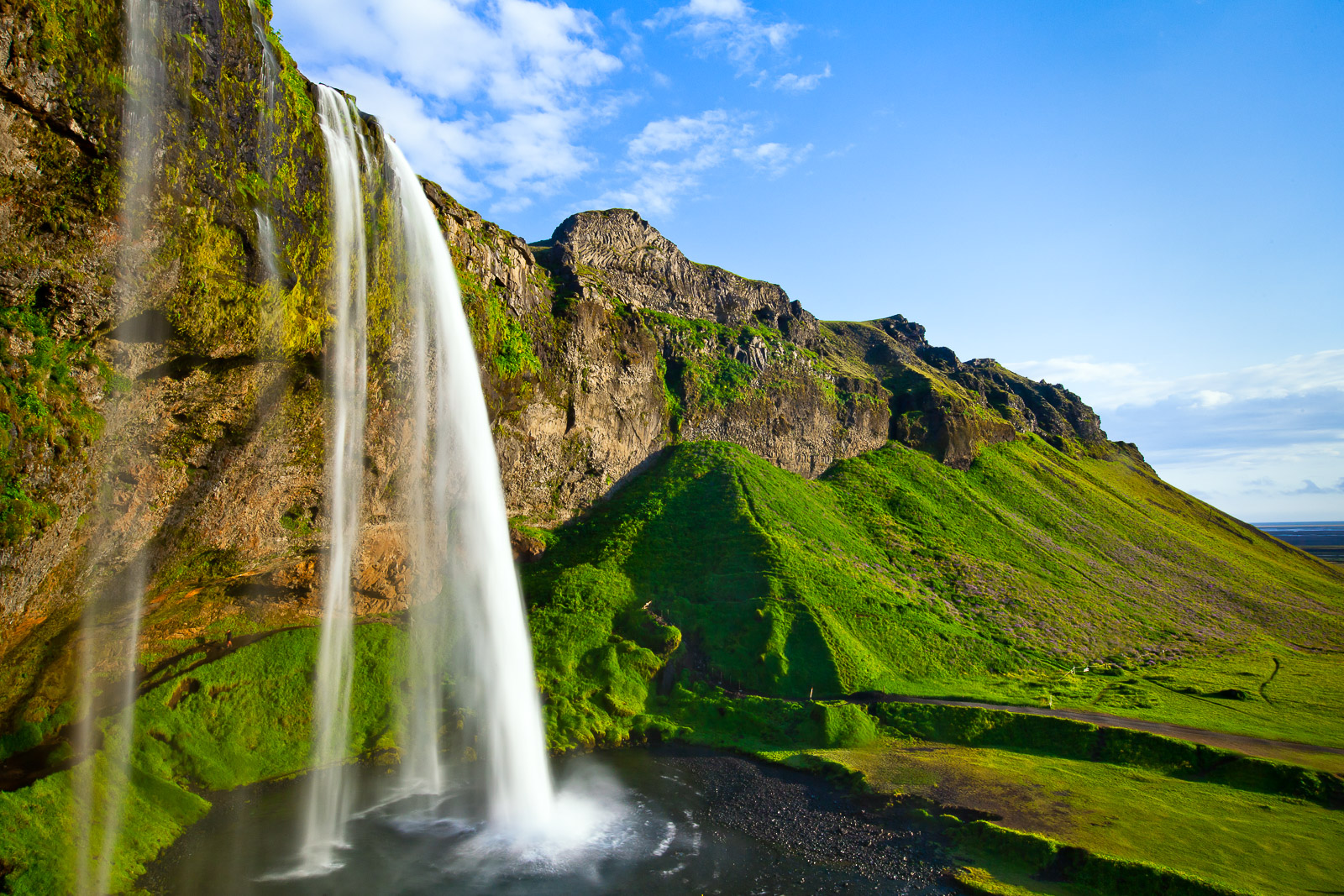 Seljalandsfoss falls is so dramatic you can just stand there and watch it for hours. This is a land of landscape jewels with...