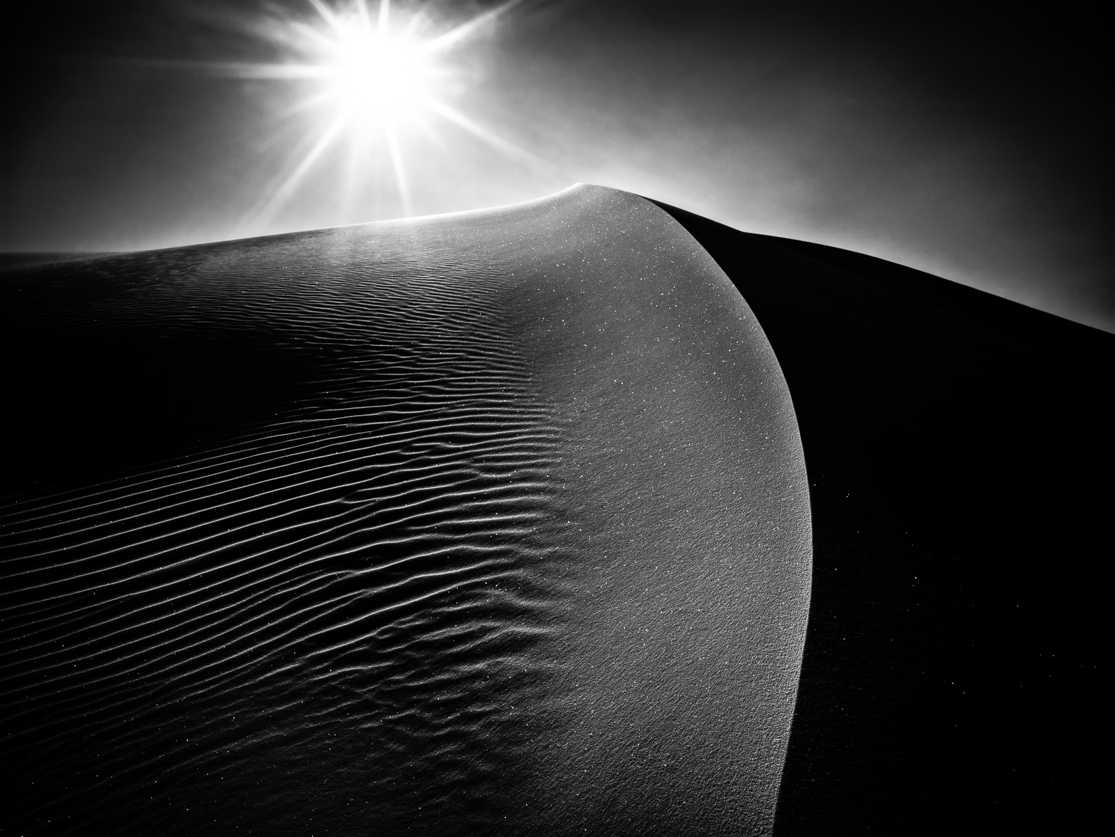 Light dances off the desert sands creating sparkling stars. This image has been a long time favorite of mine. The light just...