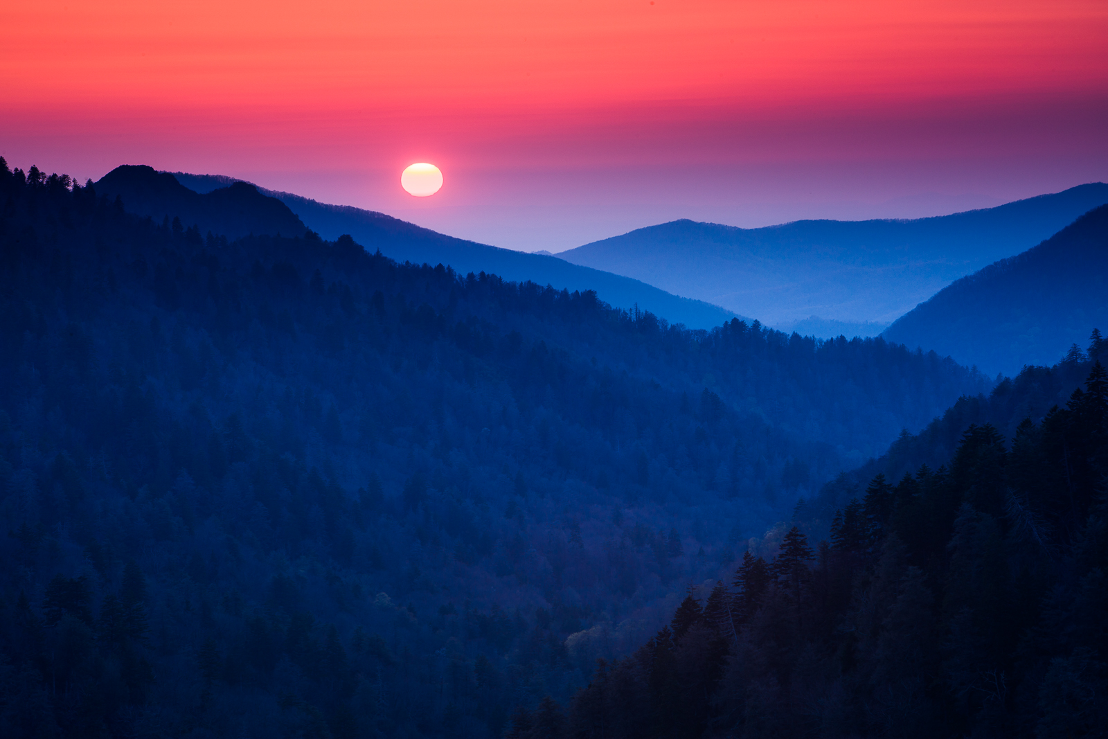 The sunsets over Smoky Mountains.   One of the highest ranges in Eastern America that can offer one of the most beautiful sunsets...