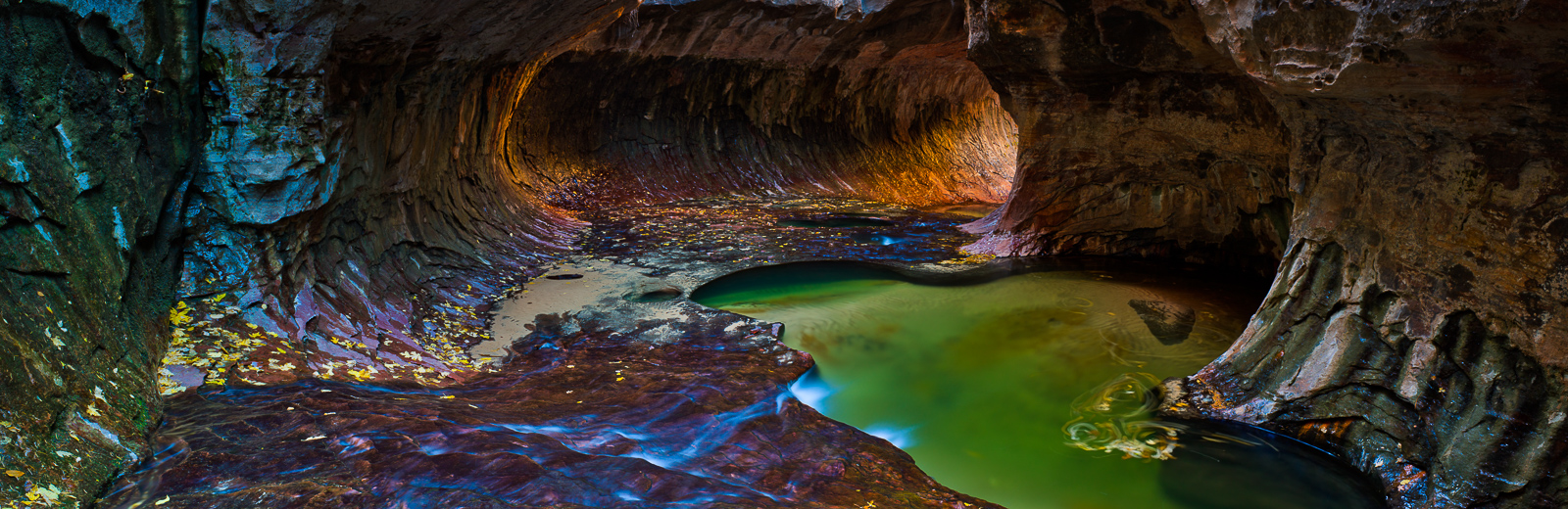Zion's remote cavern carved into the rock takes in the morning light reflected off the canyon's walls. Magical.