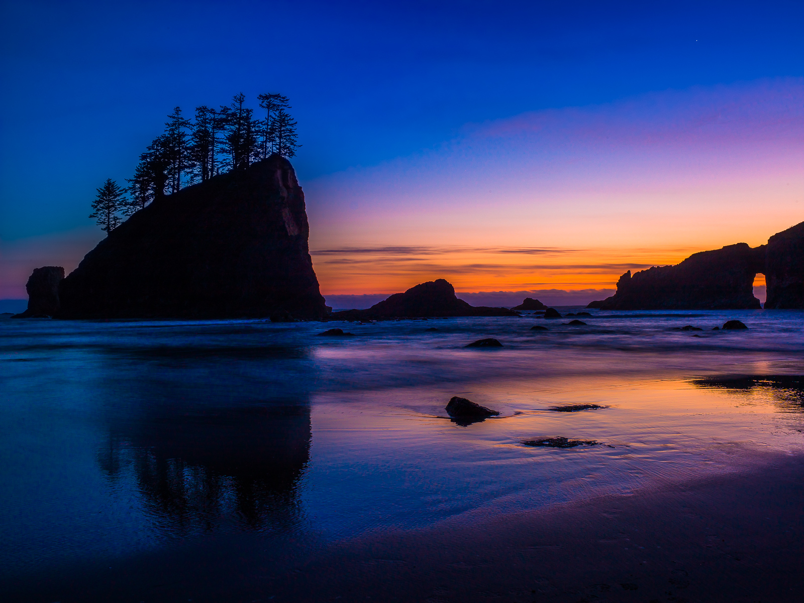 There is nothing like the sea stacks of the west coast. Tall trees stretch high above the waters around them as they stand on...