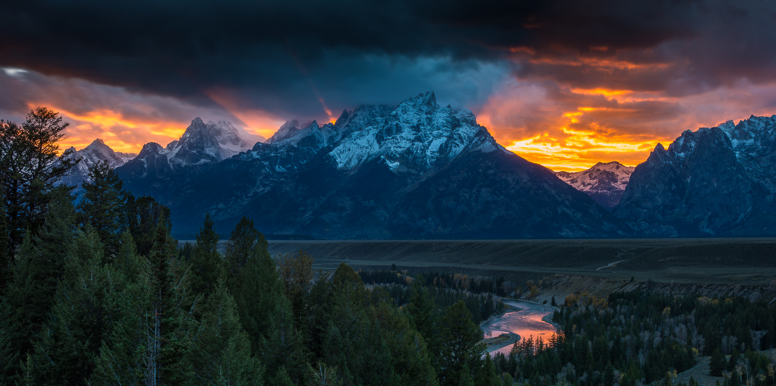 Magnificent sunsets are seen and felt. This one was no exception. The Tetons lit up as the sun bowed down to the encroaching...